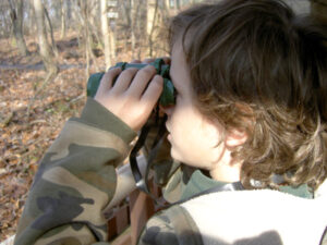 Boy with binoculars